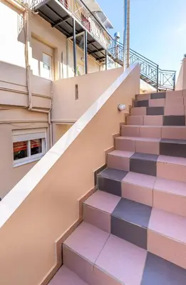 a set of stairs in front of a building at Sunny Luxury Apartment in Chania Town