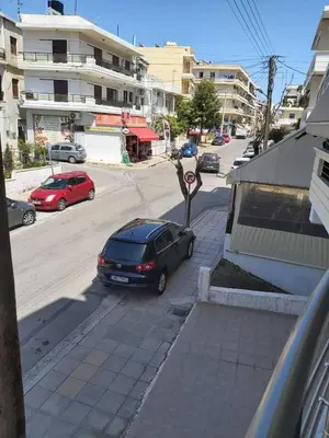 a car parked on the side of a street at Konstantina Apartment near the Beach in Chania Town