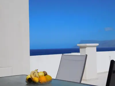 a bowl of fruit sitting on top of a table at Panoramic Balos Sea View House in Kissamos