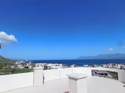 a view of the ocean from the balcony of a house at Panoramic Balos Sea View House in Kissamos