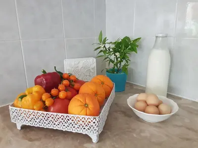 a basket of fruit and eggs and a bottle of milk at Terra Falasarna in Falasarna