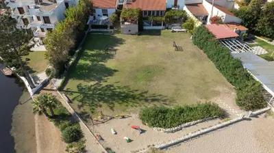 an aerial view of a yard with a playground at Ismini Apartments in Kalyves
