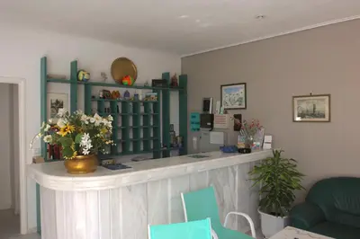 a room with a counter with flowers on it at Olga Suites in Maleme