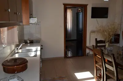 a kitchen with a sink and a counter top at Villa Eternity in Alikampos