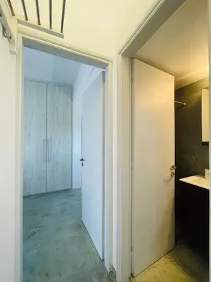 an open door in a room with a kitchen at Waves House in Kissamos