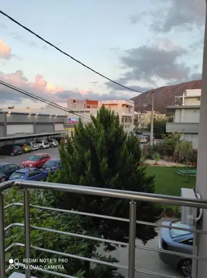 a view from the balcony of a parking lot at Homieland Souda in Souda