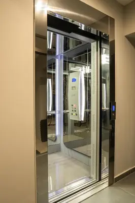a sliding glass door in a room with aillanceillanceillanceillanceillanceillanceillance at NV Illusion in Chania Town