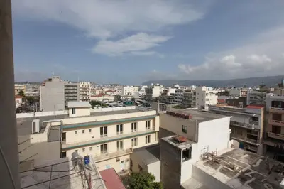 a view of a city with buildings at Rita's home in Chania Town