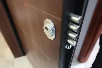 a close up of a door with a metal knob at Rita's home in Chania Town