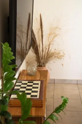a table with a keyboard and a potted plant at Tranquility House in Livadia