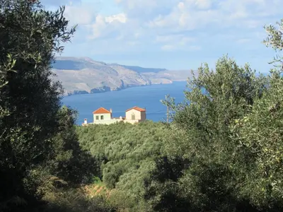 a house on top of a hill near the water at MaGea-Thalassa,Top floor Cretan studio with views in Tavronitis