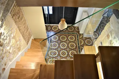 an image of a staircase with a tile floor at The Well in Chania Town