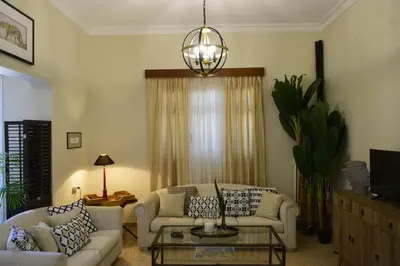 a living room with a couch and a table at Casa Armada in Chania Town