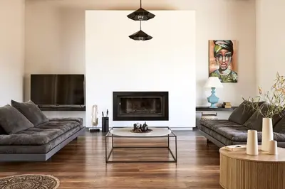 a living room with two couches and a tv at Villa Fuerte & Weddings Estate in Alikianós