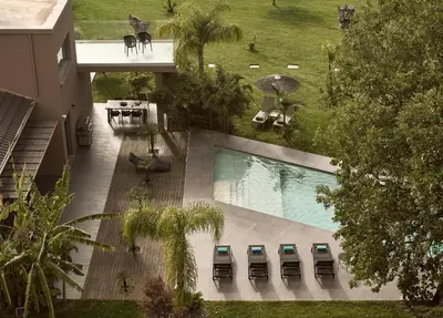 an overhead view of a swimming pool in a building at Villa Fuerte & Weddings Estate in Alikianós