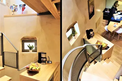 two views of a house with a staircase and a room at The Journey Design Home Chania in Chania Town