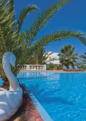 a swimming pool with a swan in a resort at Tersanas Village Apartments in Tersanas