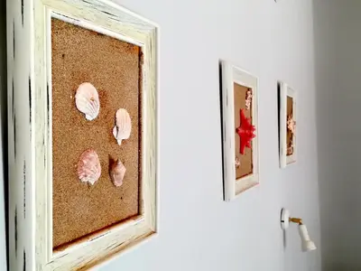 a window with seashells on the wall at CAPTAIN GEORGE in Sougia