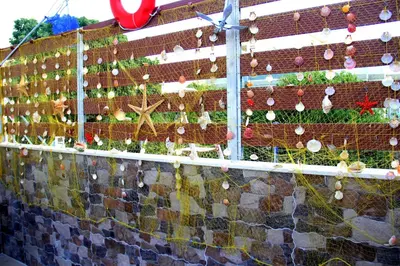 a wall with christmas ornaments on it at Chania City Home in Chania Town