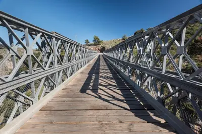 a bridge in the desert with a blue sky at ARADENA TRADITIONAL House 3 in Arádhaina