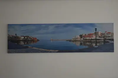 a view of a body of water with buildings at Botonis Bright Spacious Apartment in Chania Town