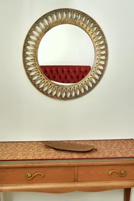 a mirror sitting on top of a wooden dresser at Modern Luxury Studio Near Beach & Old Harbor Fast WiFi Private Veranda in Chania Town