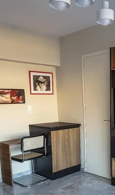 an office with a desk and a chair in a room at Sigma city loft, in the heart of Chania in Chania Town