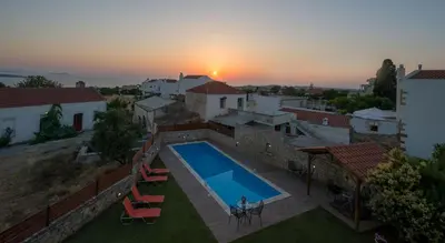 an aerial view of a villa with a swimming pool at Skandalis Apartments with pool in Chorafakia