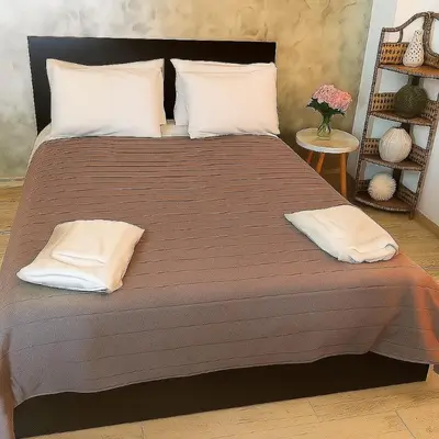 a large bed with two pillows on top of it at Elafonisi Villa above the Beach in Elafonisi