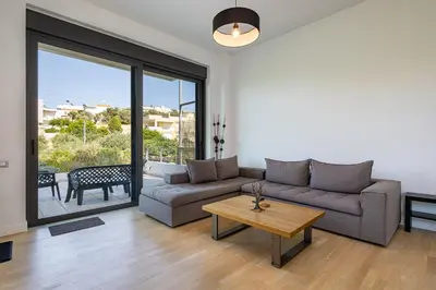 a living room with a couch and a table at Villa Darazzo with Private Pool in Daratso