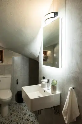 a bathroom with a sink and a toilet and a mirror at Prinus Country Retreat Apokoronas, heated pool, 13km from the sea in Embrósneros