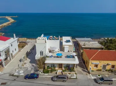 an aerial view of a city with the ocean at Celestine Suites in Kolymvari