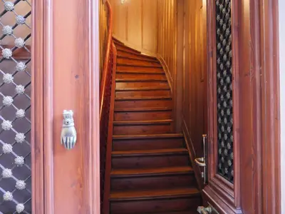 a wooden staircase leading up to a building at Old Town Suites in Chania Town