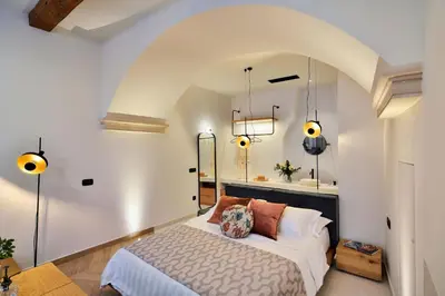 a bedroom with a large bed in a room at Neorion Living in Chania Town