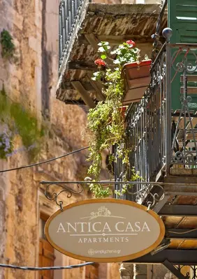 a sign for an antica casaarmaarmaarmaarmaarmaarmaarmaarma at Antica Casa Studios in Chania Town