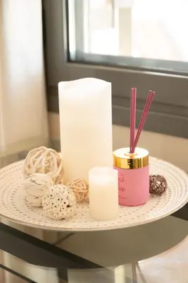 a table topped with candles and pretzels at Calme luxury residence in Chania Town