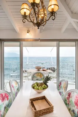 a dining room with a table with a bowl of fruit at Dream House Efi in Ravdhoúkha