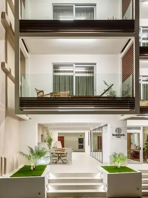 an open house with a living room and dining room at Balance Hotel in Chania Town