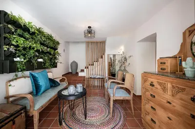a living room with a couch and chairs at Agazade Bey in Chania Town