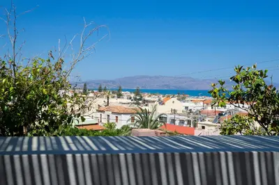 a view of a city from the top of a fence at Cretan Loft in Plataniás