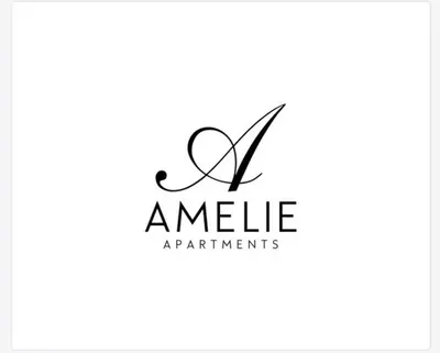 a letter handwriting amlelearmaarmaarma organisations logo at Amelie Qute Apartment in Chania Town