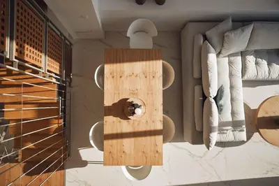 a wooden door in a room with pillows at Omnia Villas - 