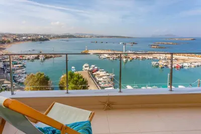 a balcony with a view of a marina at Sea & Town Getaway in Chania Town