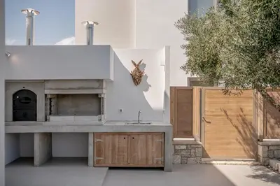 a kitchen with a counter and a sink at Anthos Villas - Chania in Tavronitis