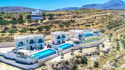 an aerial view of a house with a swimming pool at Nafsika Xenia Villa in Plátanos