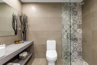 a bathroom with a toilet and a shower at Villa Vega I 