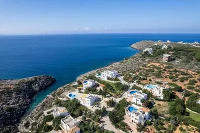 an aerial view of a villa on a rocky island at Villa Aliki ,Aegean Sea Breeze 750m from the Beach! in Chania Town