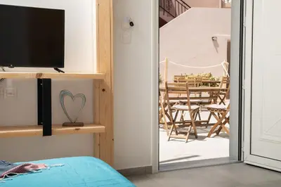 a bedroom with a sliding glass door leading to a patio at 