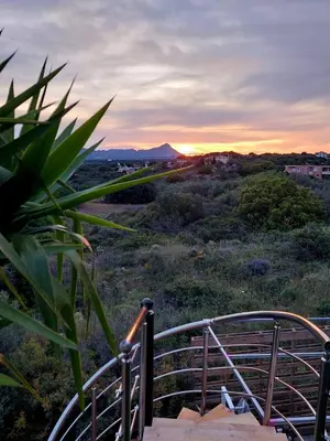 a view of a sunset from a balcony at dream tiny house & luxury tent, 6 km from center Chania in Chania Town