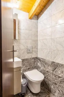 a bathroom with a toilet and a sink at Platania's Paradise in Chania Town